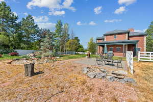 View of yard with a patio