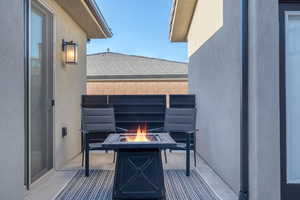 Balcony with an outdoor fire pit