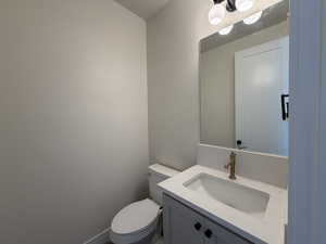 Half bath by laundry & mud room