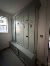 Mudroom featuring baseboards
