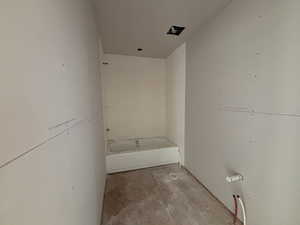 Full bathroom featuring a bath in hall upstairs