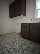 Laundry area featuring cabinet space and washer hookup