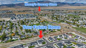 View of property location with nearby suburban area and a mountain backdrop