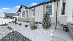 View of property exterior featuring stucco siding