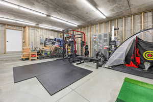 Workout room with finished concrete floors