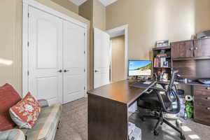 Office space with light colored carpet