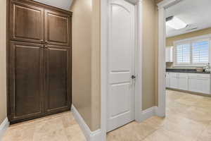 Hall featuring baseboards