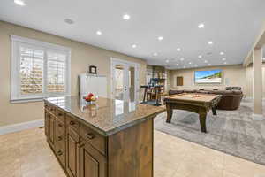 Rec room featuring recessed lighting, billiards, french doors, plenty of natural light, and light tile patterned flooring