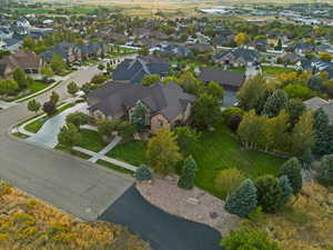 Aerial overview of property's location featuring nearby suburban area