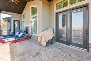 View of patio / terrace featuring a grill and a ceiling fan