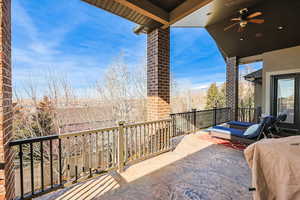 Balcony featuring a ceiling fan