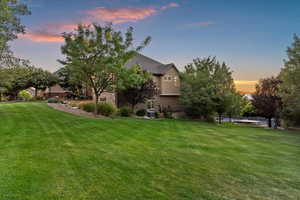 Yard at dusk with a lawn