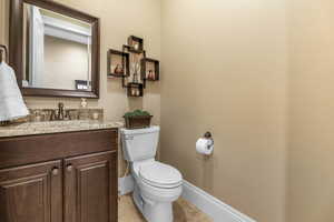 Bathroom with vanity and light tile patterned floors