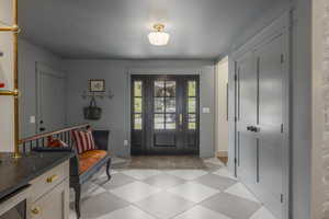 Entryway featuring beverage cooler