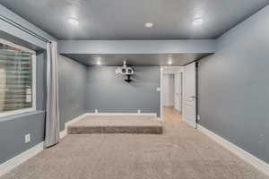 Unfurnished room featuring carpet floors and recessed lighting