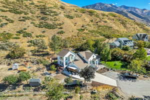 View from above of property featuring a mountainous background