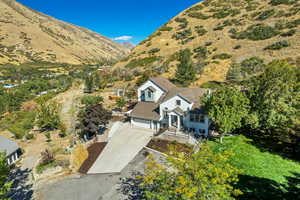 View from above of property featuring a mountainous background