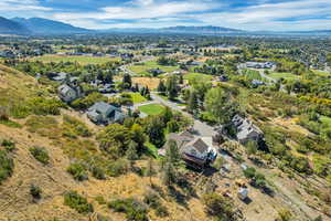 Aerial perspective of suburban area featuring mountains