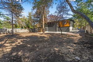 View of fenced backyard