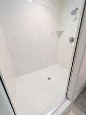 Bathroom with a large walk in shower