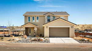 Traditional-style home featuring stucco siding, a garage, driveway, a tile roof, and stone siding