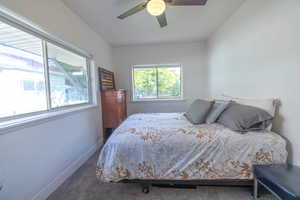 Bedroom with carpet and ceiling fan