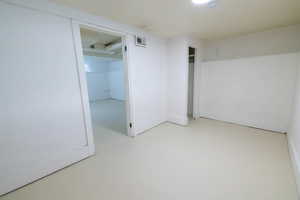 Empty room featuring concrete flooring