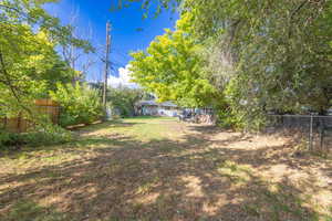 View of fenced backyard