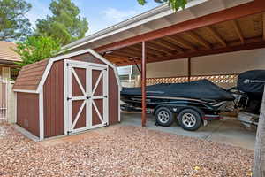 View of shed featuring a carport