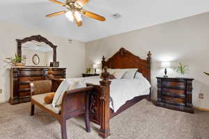 Bedroom featuring carpet floors and ceiling fan