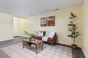 Living room featuring baseboards