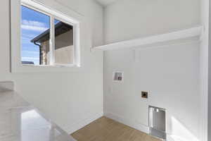 Laundry area featuring washer hookup and hookup for an electric dryer