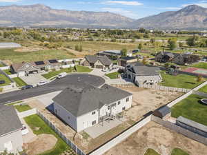 Aerial perspective of suburban area with a mountain backdrop