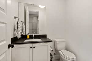 Bathroom with vanity and toilet