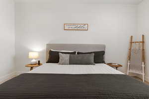 Bedroom with baseboards