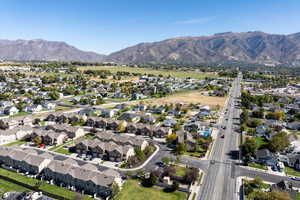 View of property location with nearby suburban area and mountains