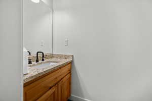 Half bath on main floor--  Bathroom with vanity