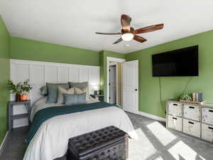 Bedroom with carpet floors and a ceiling fan