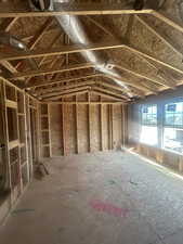 Misc room with vaulted ceiling