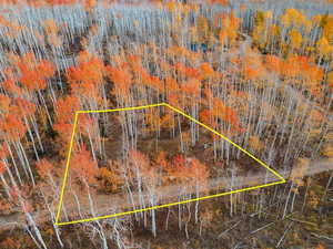 Aerial view of property's location featuring property parcel outlined