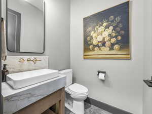 Bathroom featuring toilet and vanity