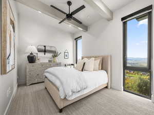 Carpeted bedroom with beamed ceiling, a ceiling fan, and recessed lighting