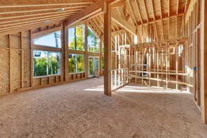 Misc room featuring high vaulted ceiling