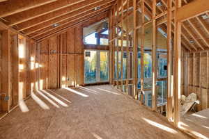 Misc room featuring vaulted ceiling