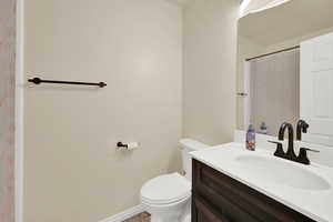 Bathroom with vanity and a shower with curtain