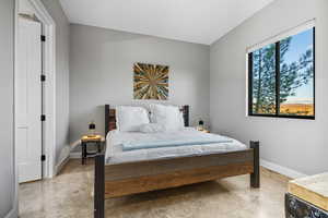 Bedroom featuring baseboards