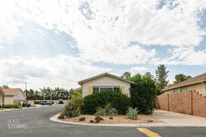 View of front of property featuring board and batten siding