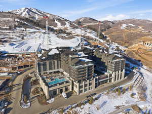 Snowy aerial view with a mountain view
