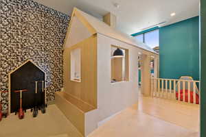 Hallway featuring an upstairs landing and carpet