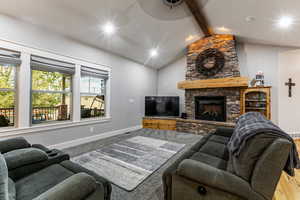 Living area featuring a fireplace and recessed lighting